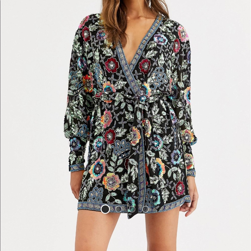 ISO floral embellished wrap mini dress.